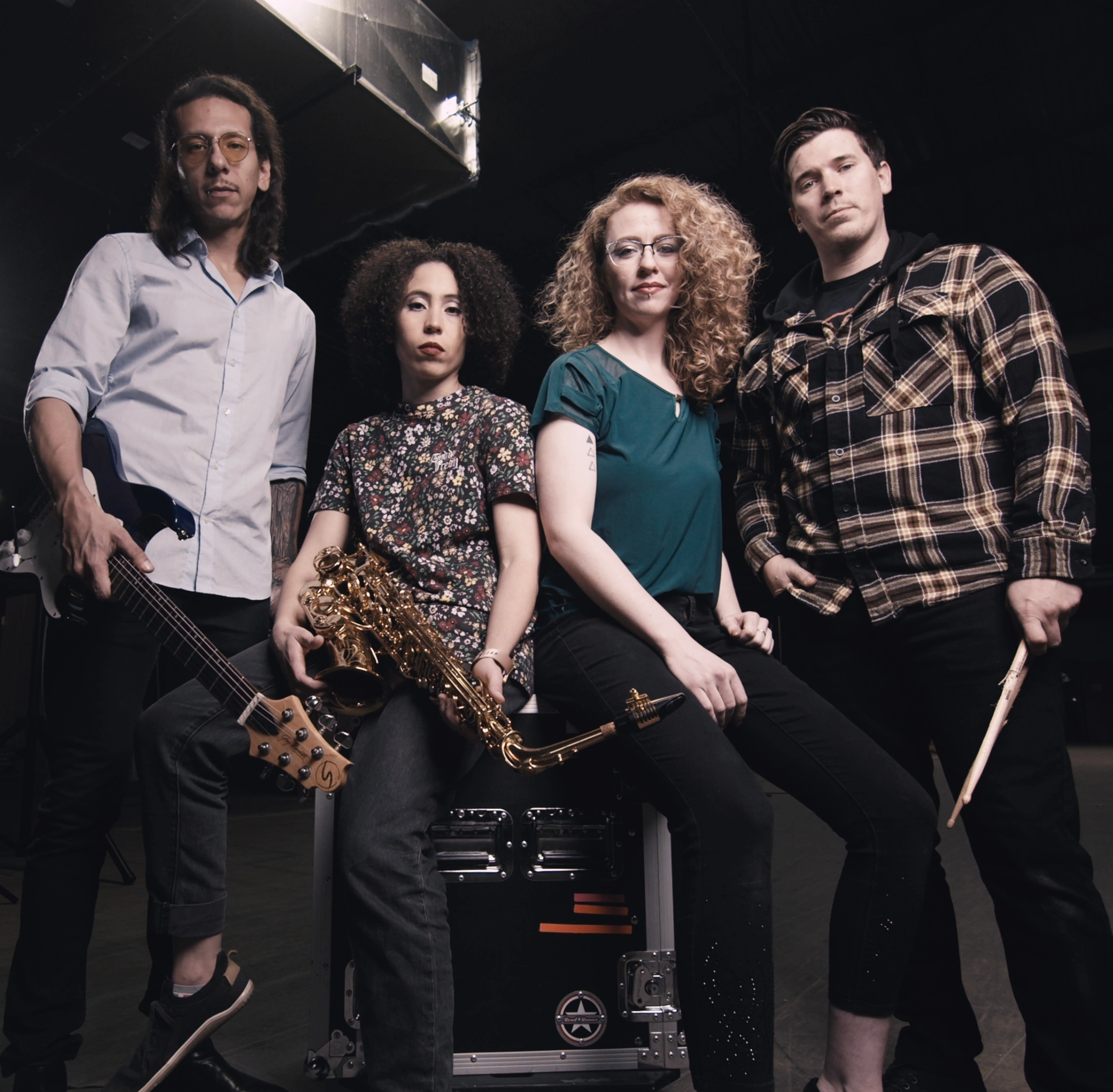 Tiny Pockets group portrait with instruments
